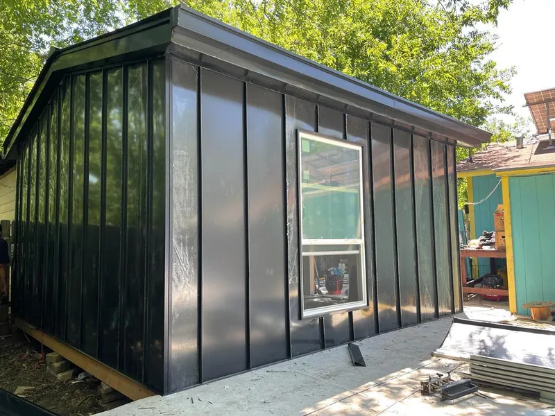 Black standing seam metal wall panels for Metal Roof Installation in Montevallo